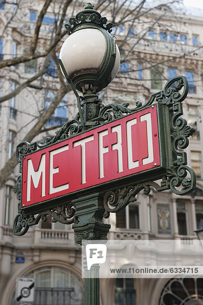 France  Paris  Paris Metro sign on lamp post