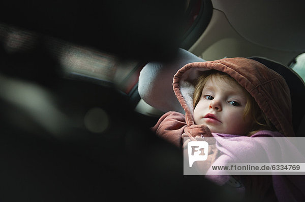Little girl in car seat  portrait