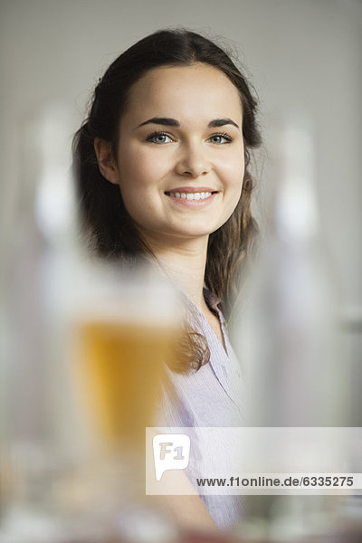 Beautiful young woman  focus on background