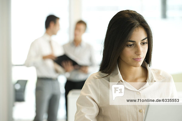 Professional woman working in office