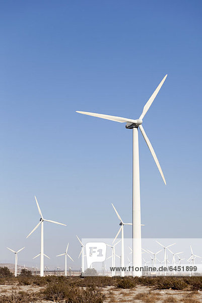 Wind turbines in a desert landscape