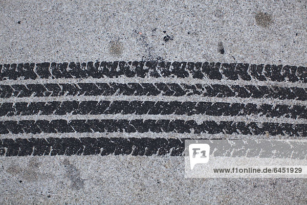 Detail of a tire mark on concrete