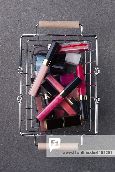 Cosmetics in shopping basket