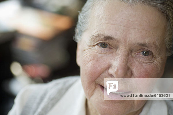 A cheerful senior woman  close-up