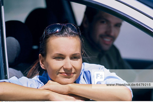 1227301 outdoor day summer spring people young woman man couple beard 25-30 brunette dark haired blouse blue smile smiling sunglasses dark close up trip vacation rest relax horizontal blur portrait lean
