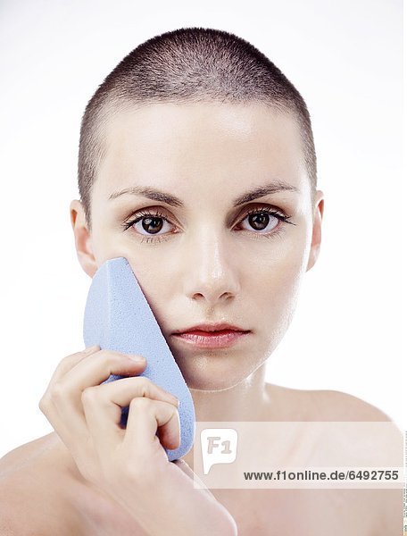 1236652 indoor studio woman people young 20-25 brunette portrait close up vertical face wash blue sponge girl