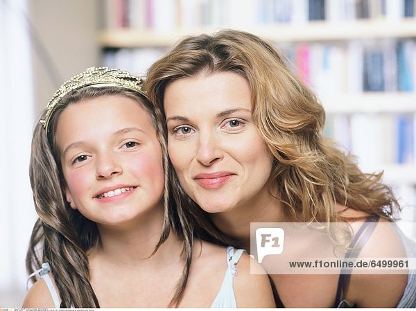 1249057 indoor people mother daughter woman 30-35 child girl 5-10 10-15 blonde smile smiling dress hair dress diadem portrait horizontal