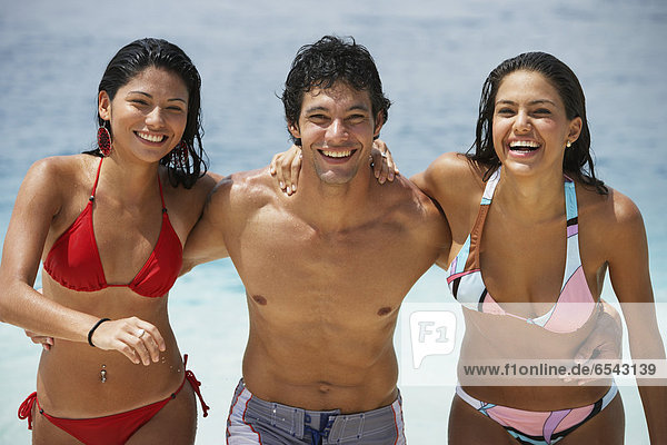 South American friends at beach