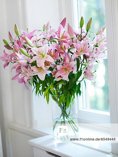 Bouquet of flowers on window sill