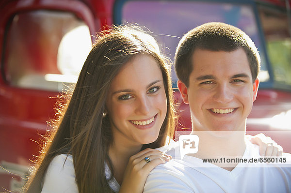 USA  Texas  Teenage boy and girl smiling  portrait