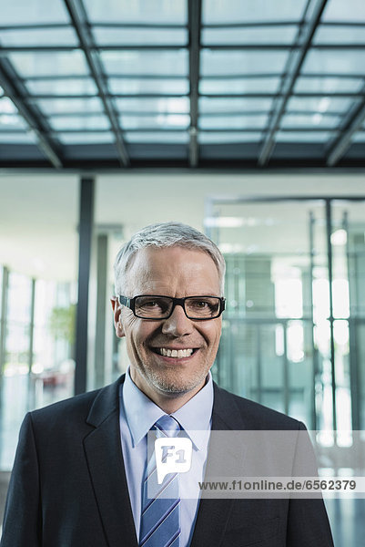 Germany  Stuttgart  Businessman smiling  portrait