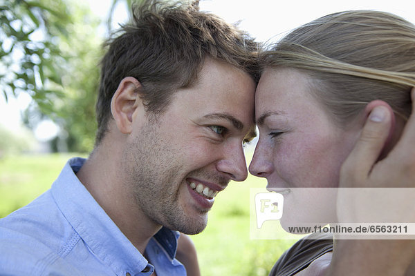 Germany  North Rhine Westphalia  Duesseldorf  Couple in romance  smiling