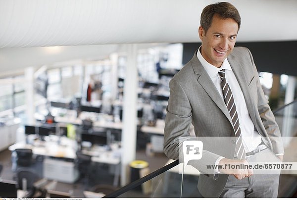 Manadatory Credit: Photo by OJO Images / Rex Features (1482544a) MODEL RELEASED Businesswoman standing in conference room VARIOUS *** Local Caption *** Model released