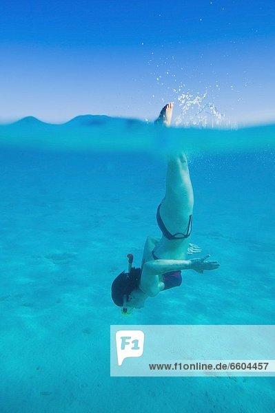 Woman Snorkelling Off Giftun Island On Red Sea Coast Near Hurghada