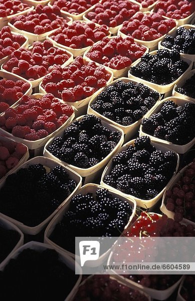 Raspberries  Blackberries  Currants In A Market