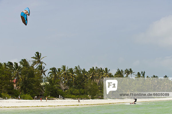Kitesurfer at Bwejuu east coast of Zanzibar Tanzania