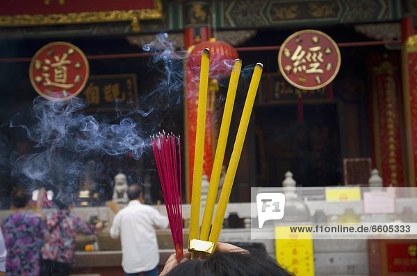 Incense Burning At Wong Tai Sin Temple