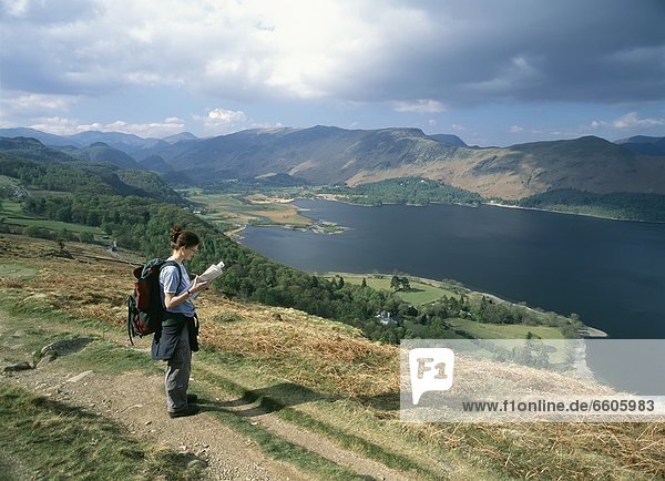 Walker Reading Map And Looking Past Derwent Water And Up Borrow Dale As Seen From Blueberry Fell