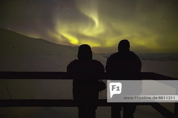 Abisko  Sweden. Tourists and the Northern Lights from the Aurora Sky Station in the Abisko National Park  200 kilometres north of the Arctic Circle. Doug McKinlay/Axiom