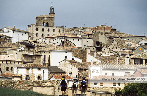 Pilgrims walking to Cirauqui village Navarra region Spain