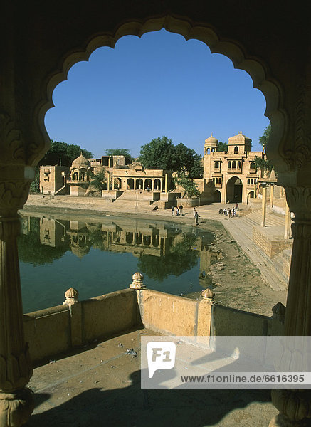 Gadisar Lake And Gateway Seen Through Scalloped Arch  Jaisalmer  Rajasthan  India (C) Sue Carpenter/Axiom