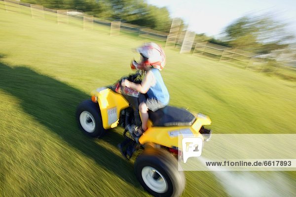 Child Driving Quad