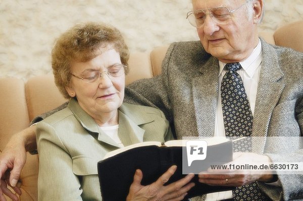 Senior Couple Reading Bible