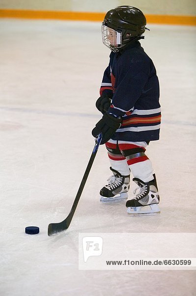 A Portrait Of A Young Hockey Player