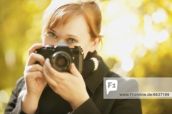 Woman With A Camera