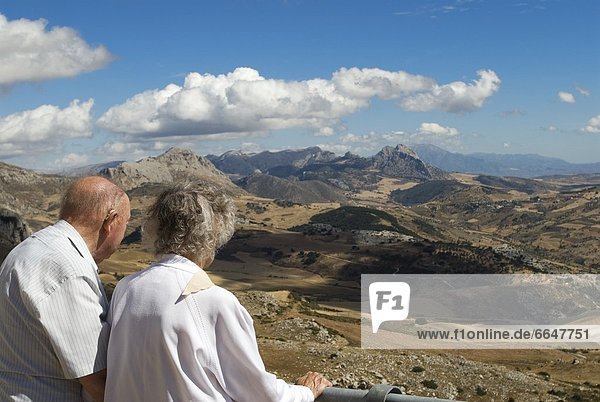 Couple Looking Out At El Torcal In Antequera  Spain