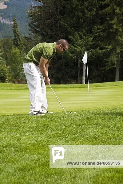 A Man Playing Golf  Fairmont  Bc  Canada