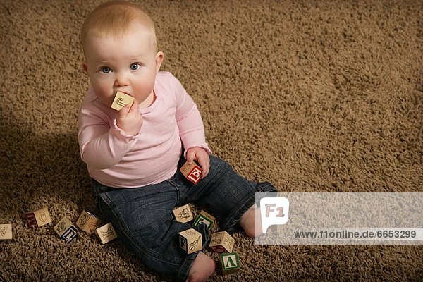Baby Playing With Abc Blocks