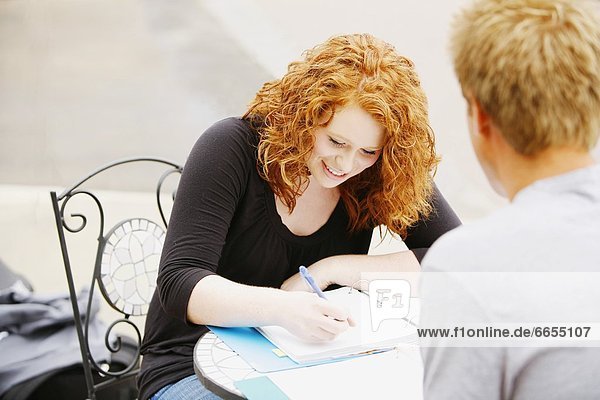 Couple Working On Homework Together