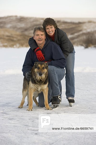 Couple And Their Dog