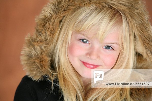 Young Girl In Brown Fur Hood