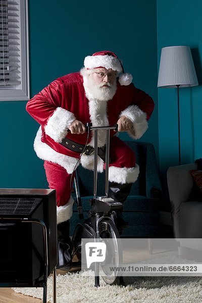 Santa Riding Stationary Bike