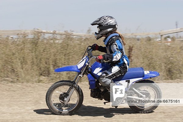 Girl On A Motorcross Bike