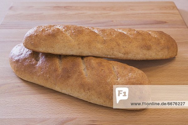 einsteigen  Brot  schneiden  Brotlaib  2  gebacken