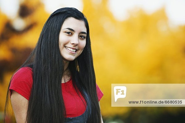 A Teenage Girl With Long Hair
