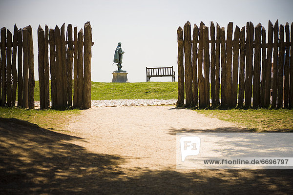 Wooden Fence And Statue Of John Smith