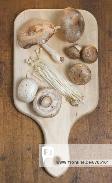 Mushrooms on cutting board