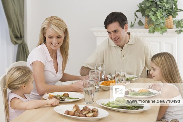 Family eating at dinner table