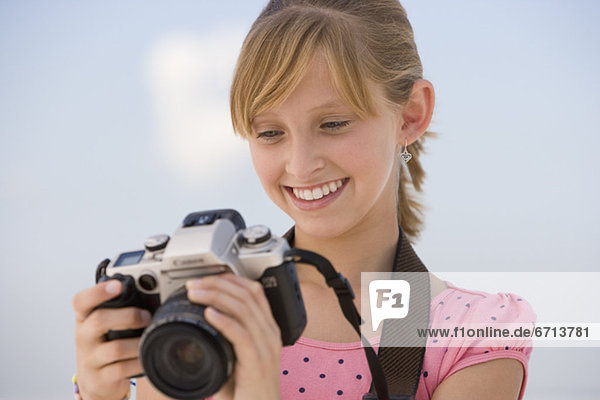 Teenaged girl looking at camera