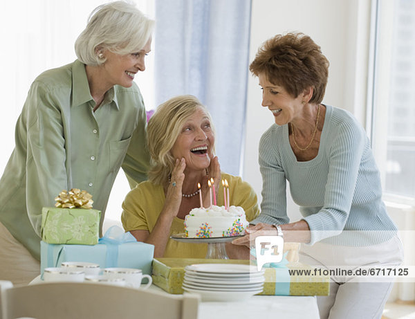 Senior women celebrating friendÕs birthday