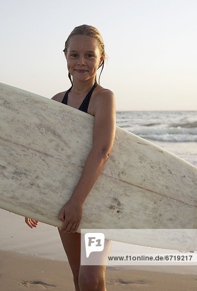 Young Girl With Surfboard