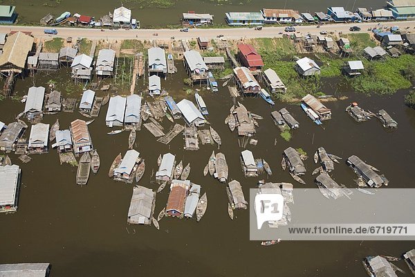 Aerial View Of The Floating Village Of Chong Kneas Bordering The Tonle Sap Lake In Cambodia
