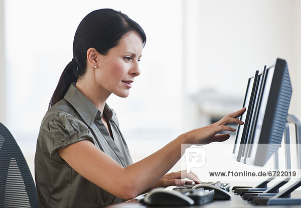 A businesswoman using a computer