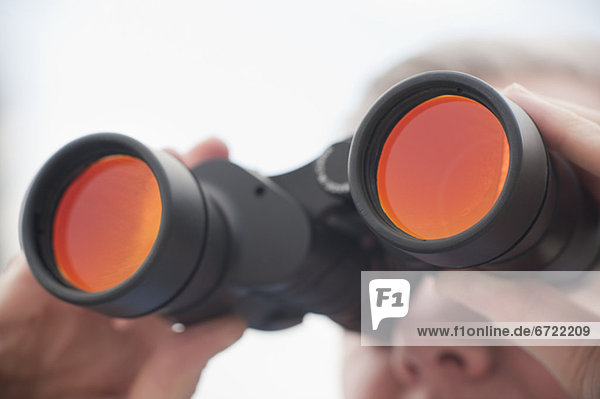 Man using binoculars