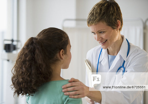 Doctor and patient in pediatrician's office
