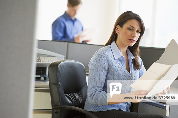 Woman working in cubicle